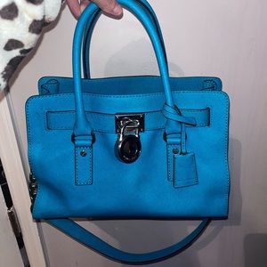 Teal medium sized Micheal Kors purse